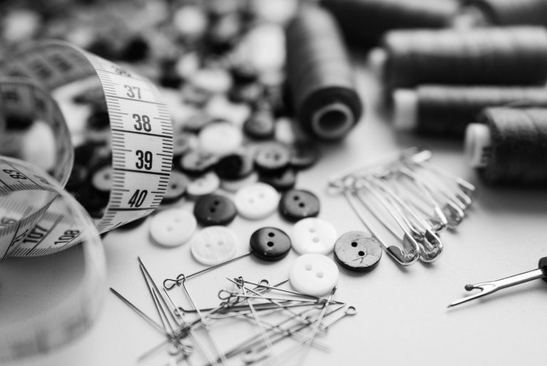 How to Sew a Button on Pants