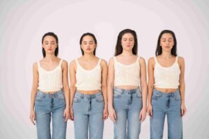 Front View Women In Different Size Tank Tops Jeans Posing Minimalist Portraits